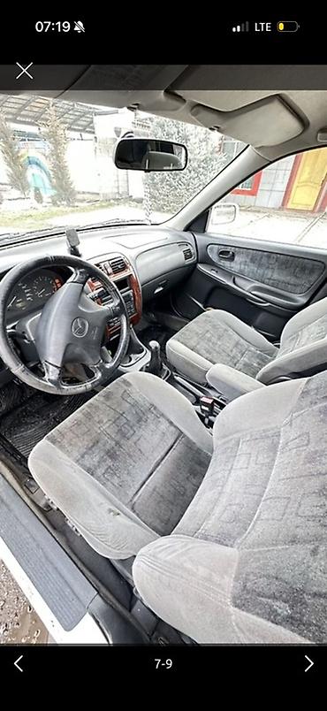 мини электро: Mazda 626: 1999 г., Универсал — 7