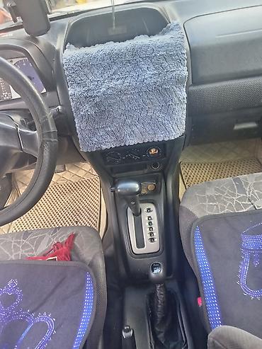 Mitsubishi: Mitsubishi Pajero iO (qısa kuzov, 3 qapı) – ağ rəngdə, şəhər və ofroud — 10