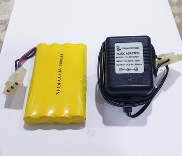 33 watt adapter: Adapter zaryatka verendir. Ştekeri ile qoşulur. Batareya esasen