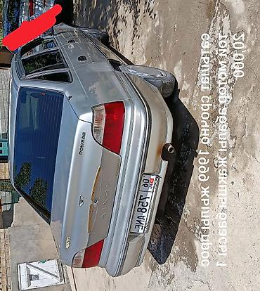 Унаа: Daewoo Nexia: 1999 г., Кол менен иштөөчү, Бензин — 1