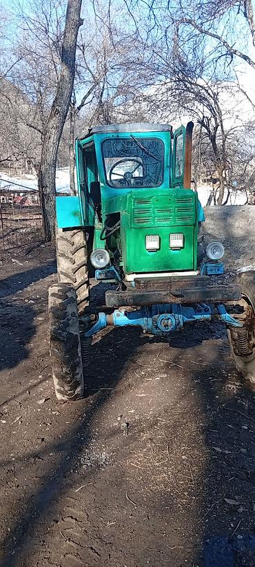 Другие тракторы: Трактор колесный, класс тяги 1,4–2,0 (визуально из серии советских — 8