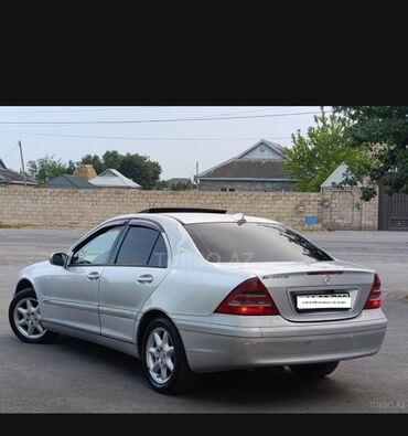 Mercedes-Benz: Mercedes-Benz C-Class sedan (W203), gümüş rəng. - Kuzov: 4 qapılı — 2