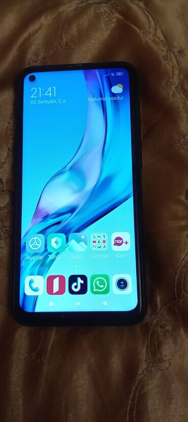 Honor: Xiaomi Redmi smartfon - Model: Redmi (arxa hissədə “Redmi” loqosu