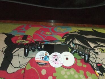 diş: PlayStation 2 Slim oyun konsolu komplekti Dəstələr: - AV kompozit