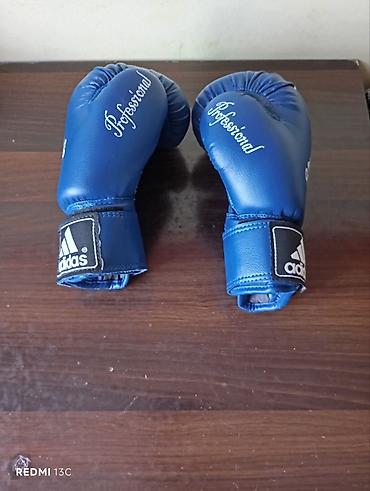 İdman və istirahət: Orijinal Adidas uşaq boks əlcəkləri satılır. Ölçüsü 4 oz (4-6 yaş — 2