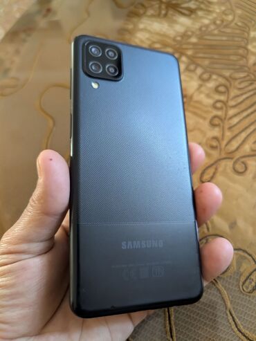 телефон fly fs529: Samsung Galaxy A12, 64 ГБ, цвет - Черный, Две SIM карты, Face ID, Отпечаток пальца