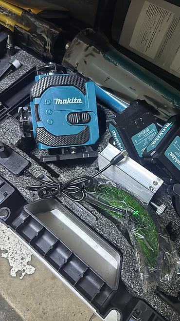 Лазерные уровни: Лазерный нивелир с зеленым лучом в комплекте с защитным оранжевым — 9