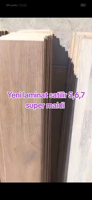 Kod 9833 Laminat satilir 5,6,7 azn Yenidi vurulub sokulub Unvan