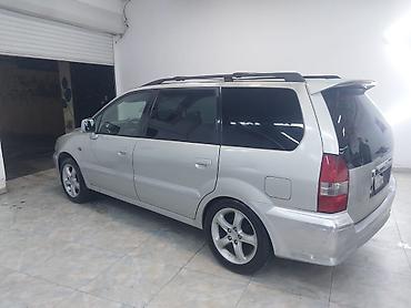 mitsubishi lancer evolution: Mitsubishi Chariot Grandis – 7 yerlik geniş ailə miniveni — 7
