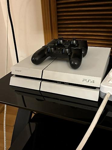 pse 4: Sony PlayStation 4 (PS4) – White versiya Xüsusiyyətlər: - Rəng: ağ — 1
