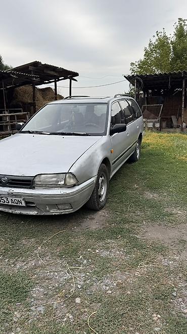 Транспорт: Nissan Primera: 1992 г., 2 л, Механика, Бензин, Универсал — 3