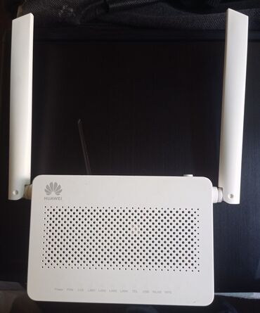 modem tenda: Huawei Router satılır. heç bir problemi yoxdur. qutusunda adapter ilə