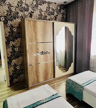 kamot guzgu: Sürgülü qapılı yataq otağı dolabı - Dizayn: İki qapılı sürgü sistemi; — 2