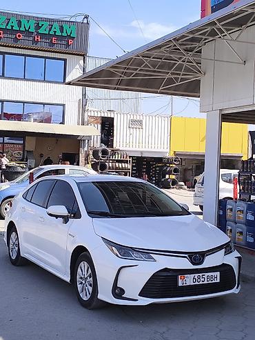 шполер: Toyota Corolla: 2021 г., 1.8 л, Вариатор, Гибрид, Седан — 1