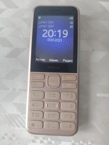 телефон fly включение: Nokia 130, цвет - Золотой, Кнопочный, Две SIM карты