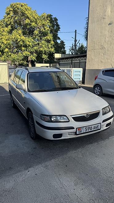 мото зонтик: Mazda Capella: 1999 г., Универсал — 3
