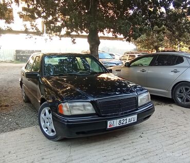 купить 15 диски: Представляем седан Mercedes-Benz C-класса черного цвета, модель W202