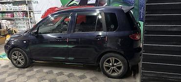 обмен на квартира: Mazda Demio: 2003 г., Автомат, Бензин — 2