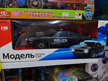 Игрушки: Модель автомобиля Police, масштаб 1:16. - Тип: игрушечная — 1