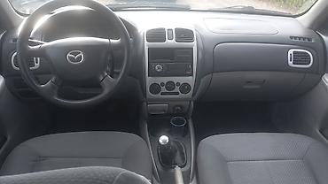 кузов евро: Mazda 323: 2002 г., 1.6 л, Механика, Бензин, Хэтчбэк — 7