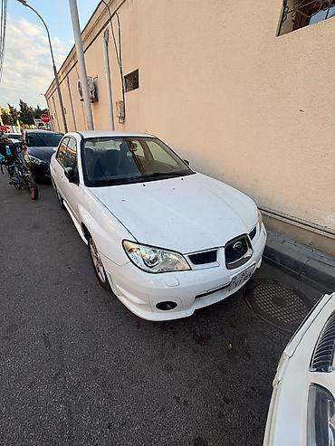kovş: Subaru Impreza: 2 l | 2007 il 301000 km Sedan — 3