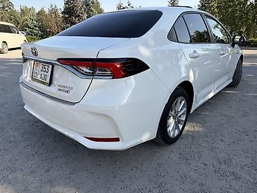 crown 2015: Toyota Corolla: 2020 г., 1.8 л, Вариатор, Гибрид, Седан — 8