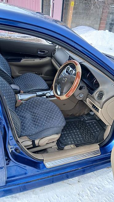 Другие детали салона: Mazda Atenza (правый руль) — интерьер - Салон бежево‑черный, тканевые — 1