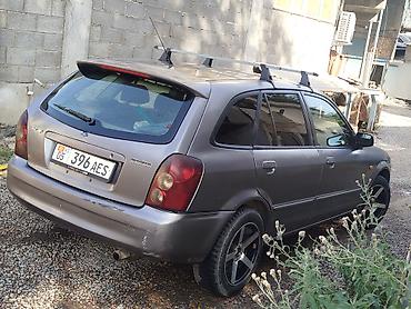мазда унивесал: Mazda 323: 2002 г., Механика, Бензин, Универсал — 3