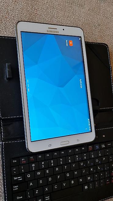 Tableti: Samsung Galaxy Tab 4 7.0 sa futrolom i mini tastaturom - Model — 11