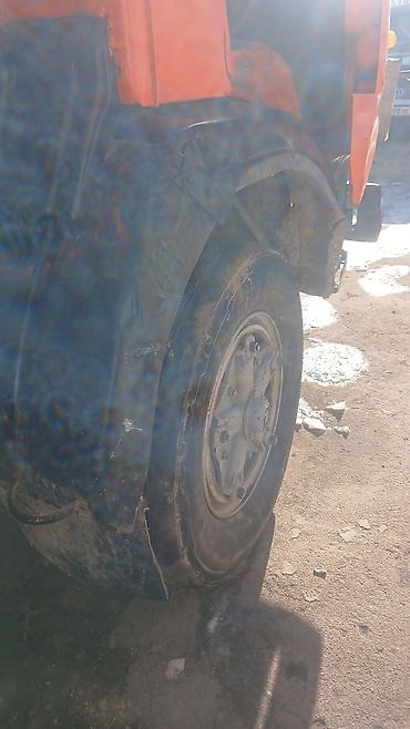 Аренда самосвала: КамАЗ самосвал, оранжевого цвета, с двускатными задними колесами — 5