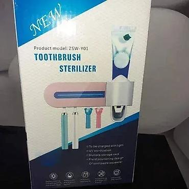 fly m550: Sterilizator za četkice + dozer za pastu – praktično i higijenski — 1