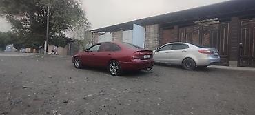 spark ltz: Mazda 626: 1996 г., 2 л, Механика, Бензин, Хэтчбэк — 1