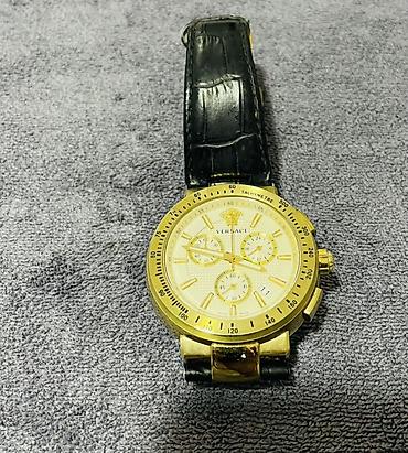 gloria saat: Versace qol saati . Qizil suyuna salinib cox keyfiyetli saatdir saffir — 5