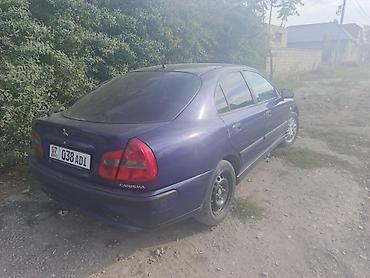 таластан там: Mitsubishi Carisma: 2004 г., Бензин, Лифтбек — 2