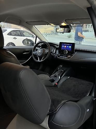 byd e2: Toyota Corolla: 2022 г., 1.8 л, Автомат, Гибрид, Седан — 6