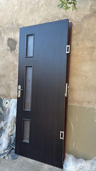 kombi panel radiatorlar: Tünd qəhvəyi rəngdə otaq qapısı. Müasir və zövqlü dizayna malikdir — 1
