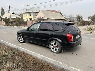 мазда 620: Mazda Familia: 2003 г., 1.6 л, Механика, Бензин, Хэтчбэк — 7