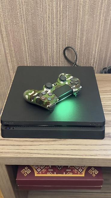 Sony PlayStation 4 Slim oyun konsolu - Rəng: qara - Korpus: kompakt