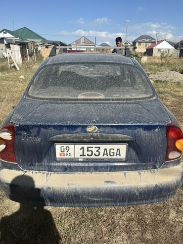 срочно продаю в связи с переездом: Daewoo : 2009 г., 1.5 л, Механика, Бензин, Седан