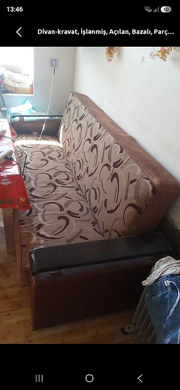 Divan yaxşı vəziyyətdədir.açılır baza var