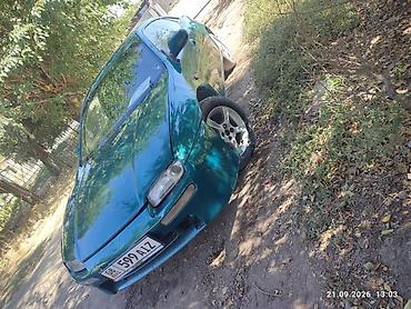 зарядка электровелосипеда: Mazda 323: 1996 г., 1.8 л, Механика, Бензин, Седан — 1