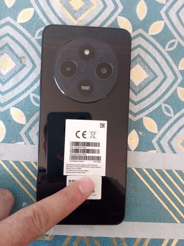 телефон fly iq440: Redmi 14c. Çox az işlənilib. Arxa tərəfində dairəvi kamera modulu olan