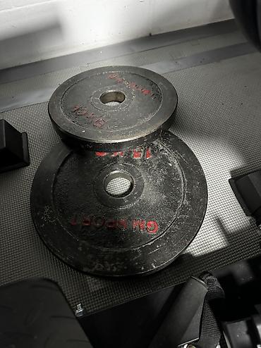 грифы: Блины чугунные по широкий гриф 10 кг - 2 шт и 15 кг - 2 шт 170 сом — 2