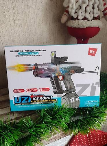 inkişaf etdirici oyuncaqlar: ● Bu, "Uzi Ice Horn" modeli olan elektrikli su tapançasıdır ● Tapança — 6