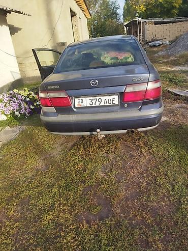 sprinter 516: Mazda 626: 1999 г., 1.8 л, Механика, Газ, Седан — 7