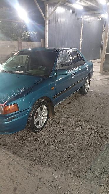 5: Mazda 323: 1991 г., 1.5 л, Механика, Бензин, Седан — 2