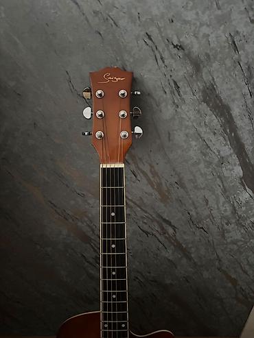 gitara qiymeti: Klassik gitara ilə barter olunur.Sniker firmasına aid akustik — 3