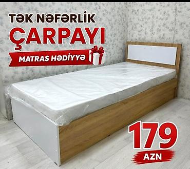 carpayl: Tək nəfərlik çarpayı — sadə və funksional dizayn. - Rəng: ağ və ağac — 1