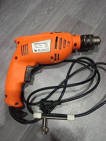 Zərbəli drellər: Drell Məhsul: Zərbəli elektrik matkap - Güc: 500 W - — 2