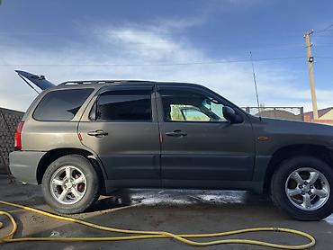 другие марки: Mazda Tribute: 2003 г., 2 л, Механика, Газ, Кроссовер — 1